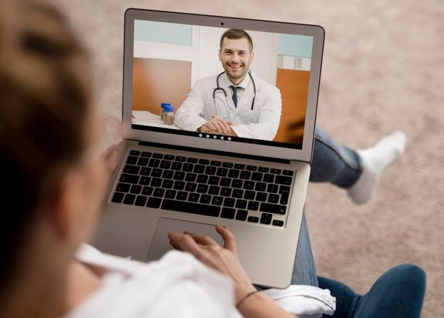Patient video-calling with a doctor