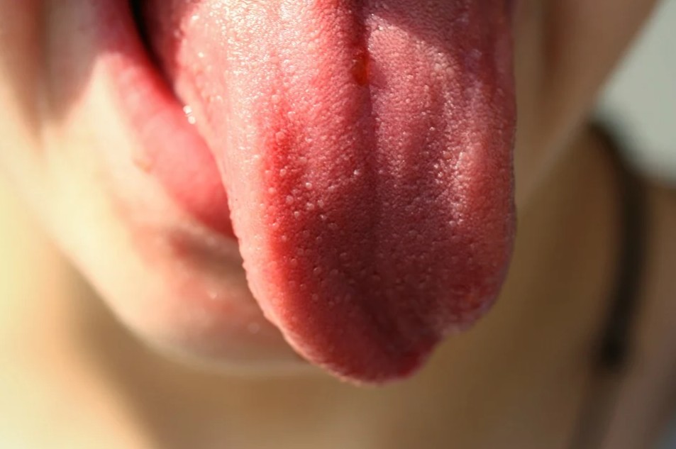 a person holding their tongue out